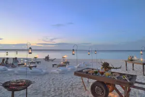 Sunset beach picnics at Mnemba Island. 