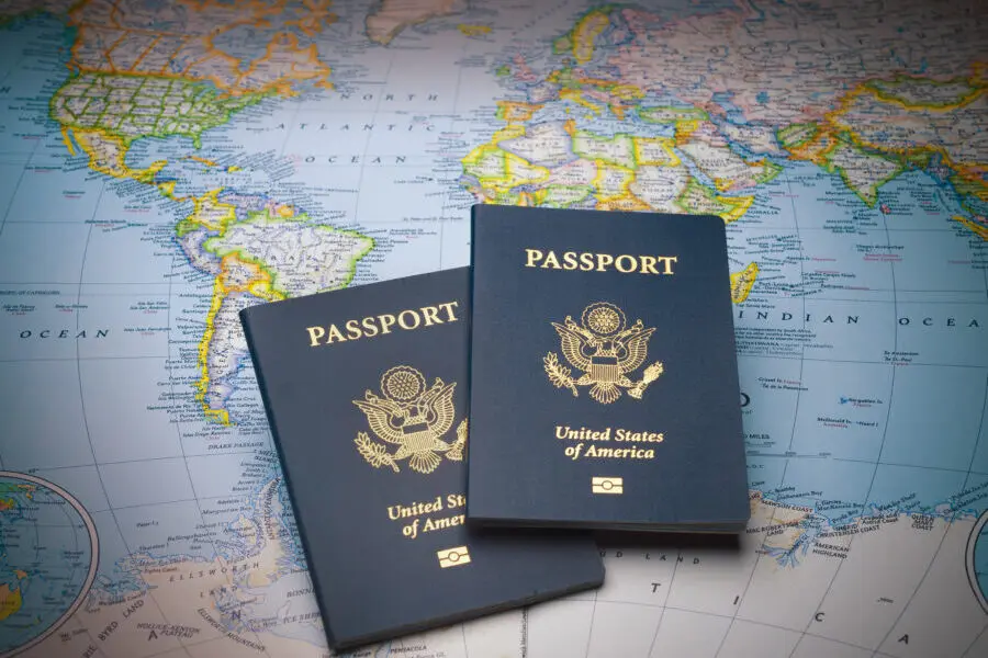 Passports on a map of the world to illustrate the keys to world travel