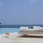 While away leisure hours at the infinity pool. 