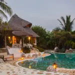 The private villa at dusk. 