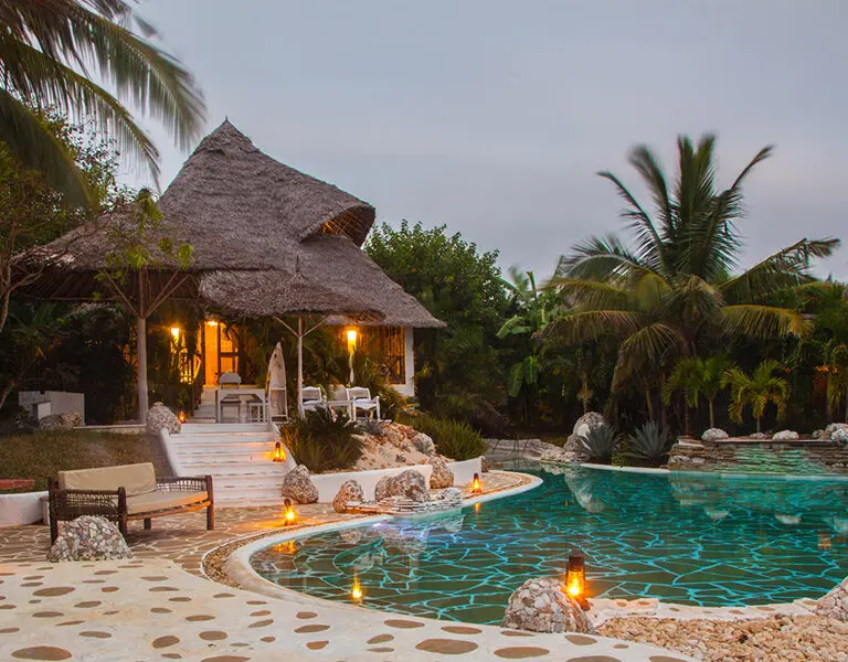 The private villa at dusk. 