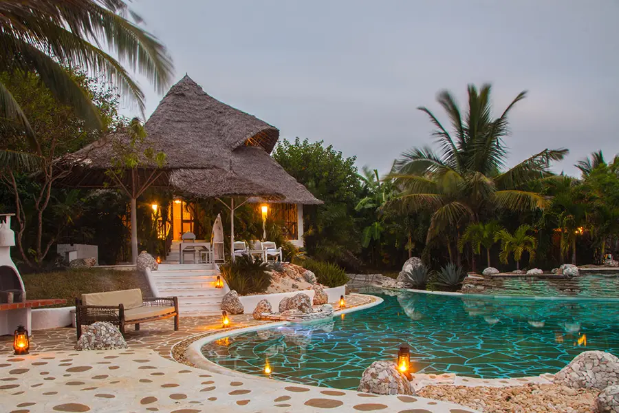 The private villa at dusk. 