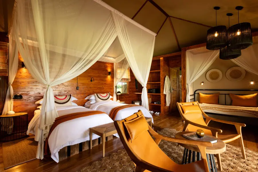 Relax and feel at home in a safari-chic tented suite. 