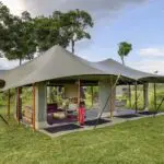 An open-air lounge area is a great spot to sit back and relax after your morning game drive.