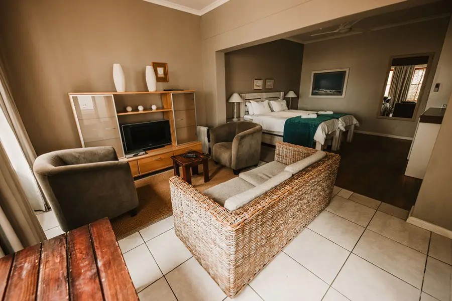 A spacious and cosy living room invites family movie nights.