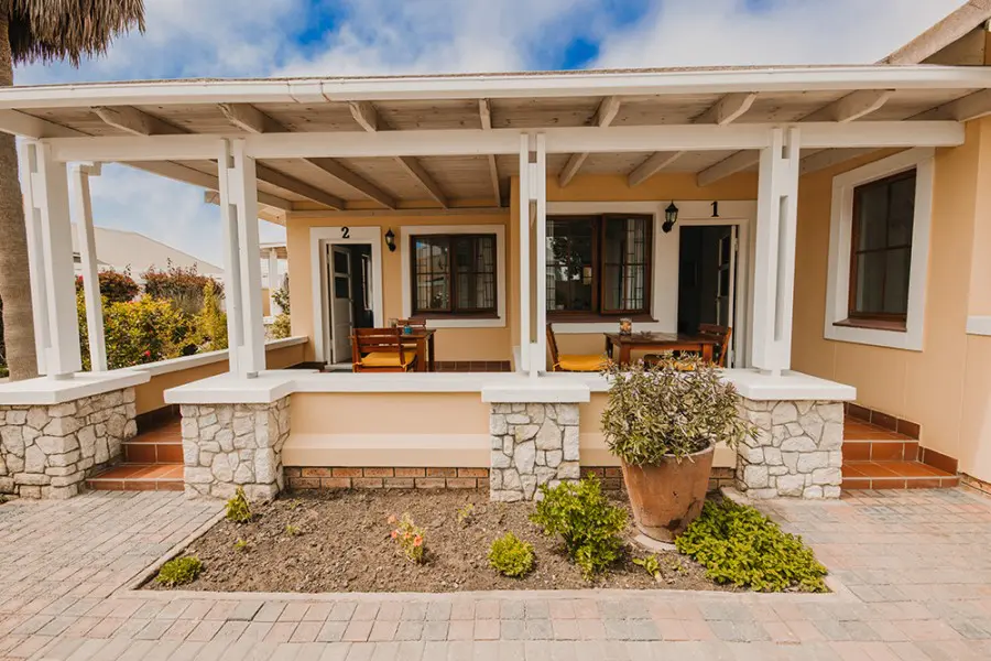 Enjoy the views of the manicured gardens from your patio. 