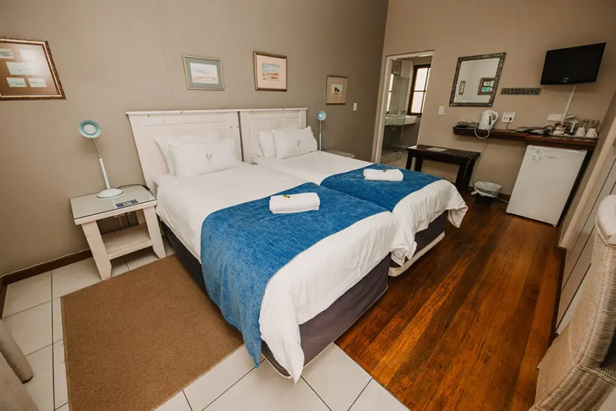 Spacious bedroom with coffee nook is ideal for two people.