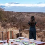 Sipping a coffee and enjoying the views of Kili | Elephant Gorge Camp