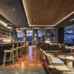 Grab a drink from the bar to enjoy on deck. 