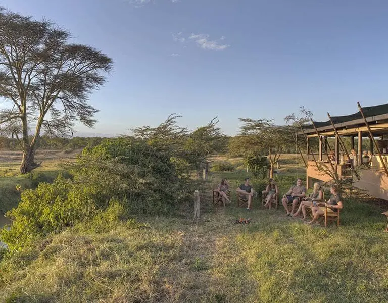 asilia-ol-pejeta-bush-camp-guests-enjoying-sundowners-at-the-main-area-2
