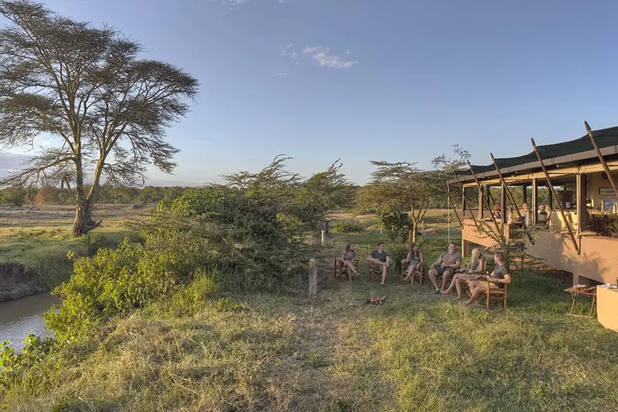 asilia-ol-pejeta-bush-camp-guests-enjoying-sundowners-at-the-main-area-2