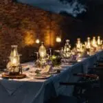 Relish in outdoor boma dining with a lantern-lit ambiance.