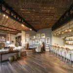 Set out next to the bar to exchange stories over drinks.