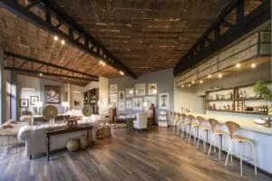 Set out next to the bar to exchange stories over drinks.