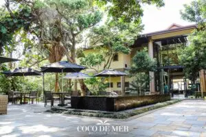 A beautiful garden courtyard invites you to sip on a coffee or cocktail. 