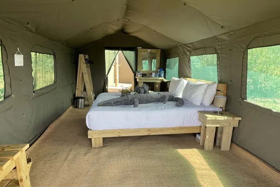 Each room is equipped with side tables and hanging space for your clothing items. 