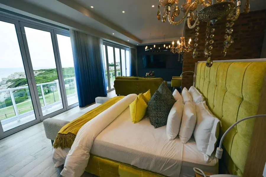 Enjoy non-stop views of the sea from your cosy king-sized bed.
