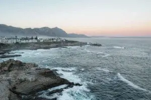 Witness the majesty of crashing waves against the rugged shoreline.