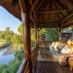The raised deck area overlooks the river. 