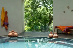 Take a dip in the swimming pool.