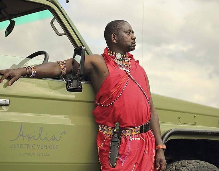 ol-pejeta-bush-camp-electric-vehicle-and-maasai-guide