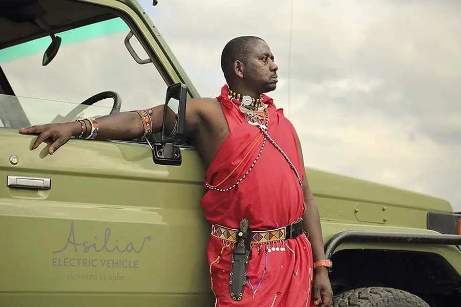 ol-pejeta-bush-camp-electric-vehicle-and-maasai-guide