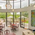 The indoor dining area is bathed in natural light.