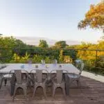Enjoy intimate sundowners with panoramic views of the gardens and surrounds. 