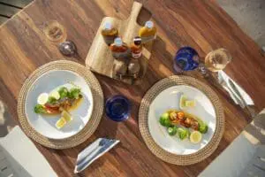 Indulge in delicious Portuguese cuisine, amidst a variety of tropical backdrops.