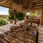 An outdoor lounge area welcomes an armchair safari, allowing you to marvel as animals pass by while sipping on a refreshing drink.