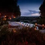 As the sun sets, the lodge comes alive with fairy-tale lanterns, creating a mystical ambiance.