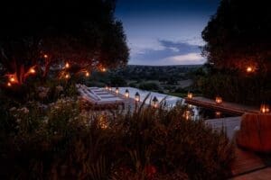 As the sun sets, the lodge comes alive with fairy-tale lanterns, creating a mystical ambiance.
