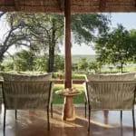 Your idyllic verandah at Chobe Chilwero Lodge.
