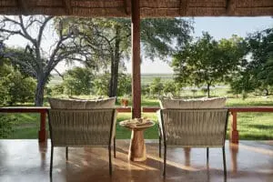 Your idyllic verandah at Chobe Chilwero Lodge.