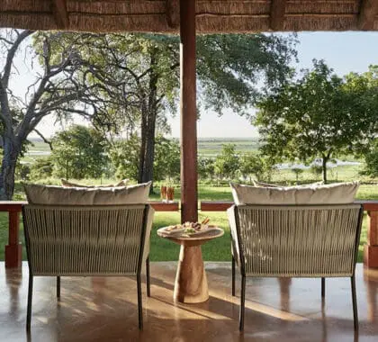 Your idyllic verandah at Chobe Chilwero Lodge.