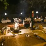 An open-air boma provides a perfect safari dining setting with a romantic lantern-lit ambiance. 