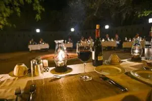 An open-air boma provides a perfect safari dining setting with a romantic lantern-lit ambiance. 