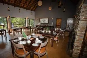 An indoor dining setting is perfect for escaping the heat of the day. 