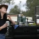 Your morning game drive includes coffee and rusks amidst a bush backdrop. 