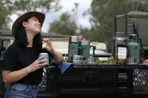 Your morning game drive includes coffee and rusks amidst a bush backdrop. 