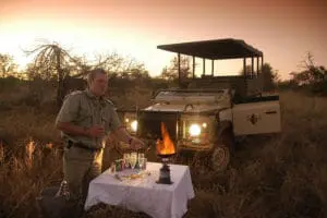 Enjoy sundowners in the bush during evening game drives.