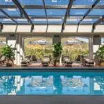 An indoor heated pool invites a luxury swim for all seasons. 