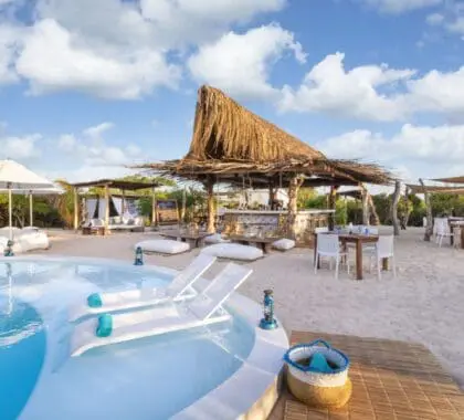 Visit the Peri-Peri Beach Club for a lively atmosphere, with cocktails and swimming.