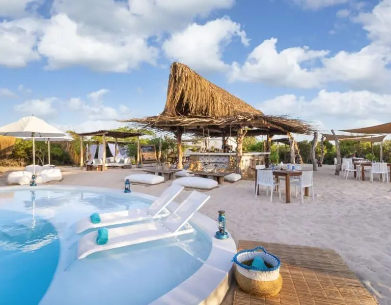 Visit the Peri-Peri Beach Club for a lively atmosphere, with cocktails and swimming.