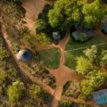 Africa on Foot is an intimate camp nestled in between lush grass and trees. 