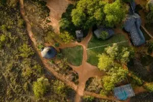 Africa on Foot is an intimate camp nestled in between lush grass and trees. 