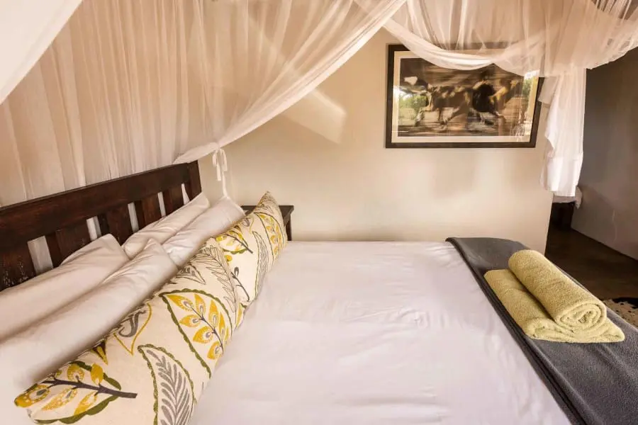 A cosy double bed invites a blissful night's rest. 