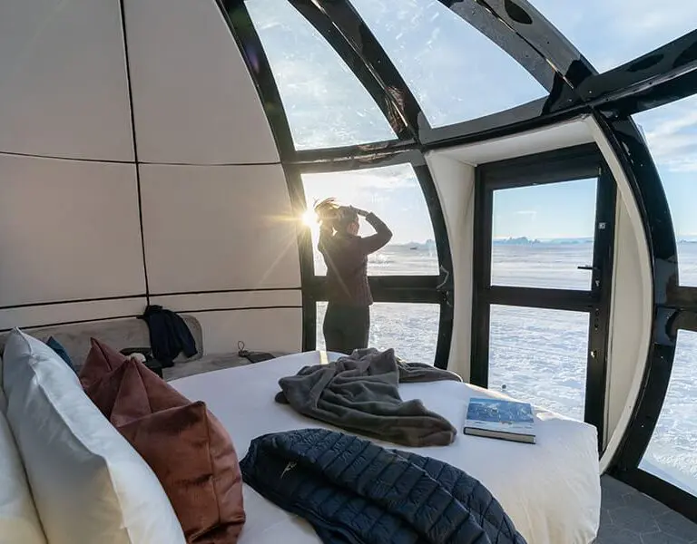 Wake up to views out over the Antarctic ice sheets while warm and cosy in your Sky Pod.