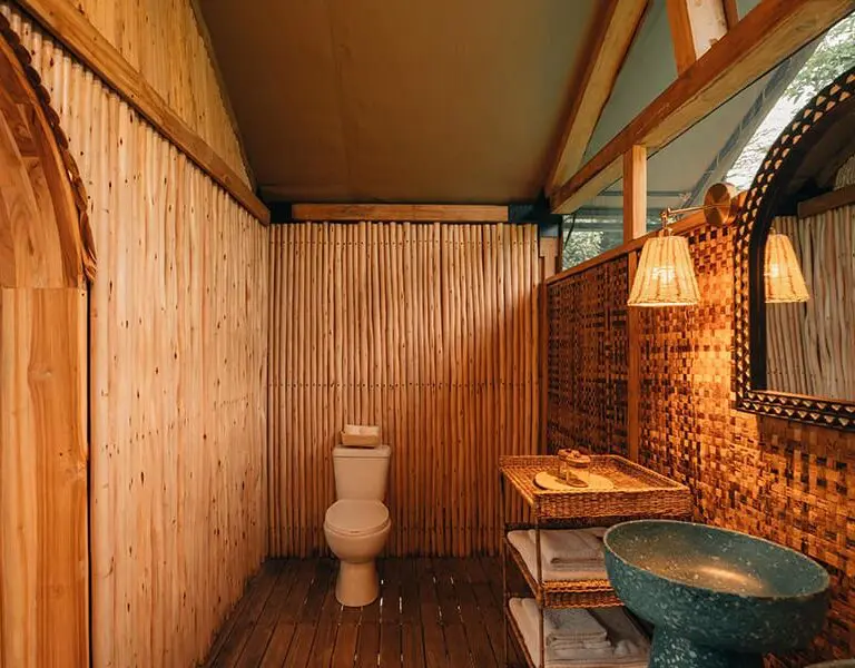 Though this is a bush camp, the en-suite bathrooms have flush toilets and hot showers.