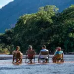 Drinks with you feet in the water, a special safari 'green season' experience. 